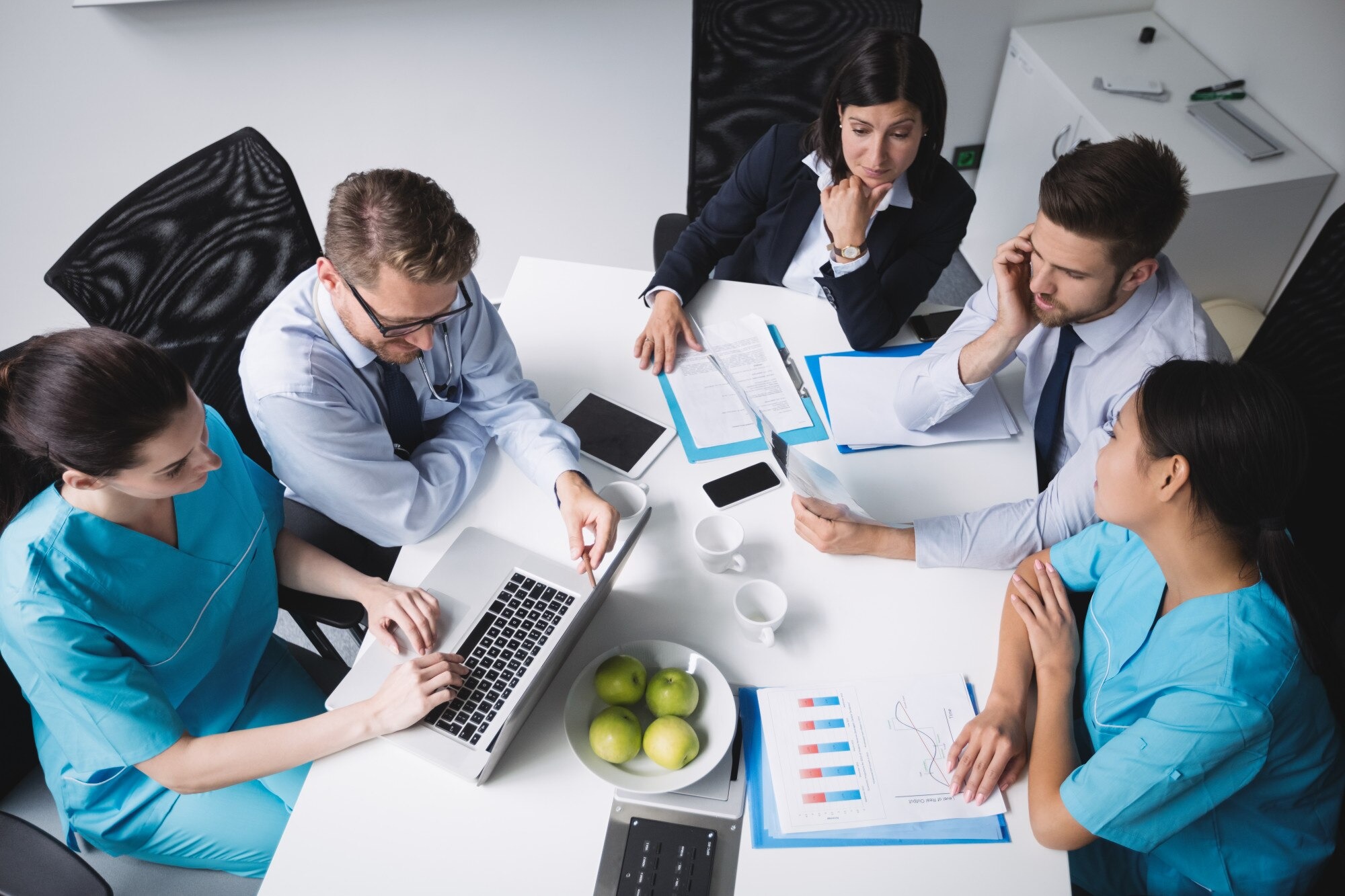 Healthcare professionals collaborating on a pharmaceutical market strategy